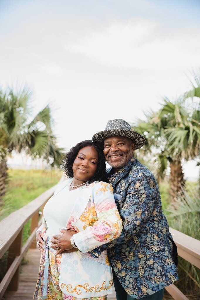 An embrace among the palms